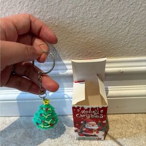 Merry Christmas doll pendant. Open box